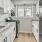 a kitchen with white cabinets