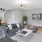 a living room with a couch and a table
